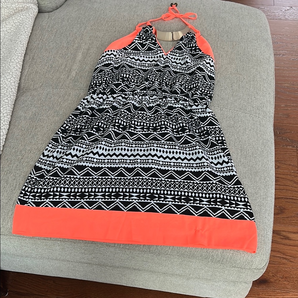 Black and White Patterned Dress with Orange Accents